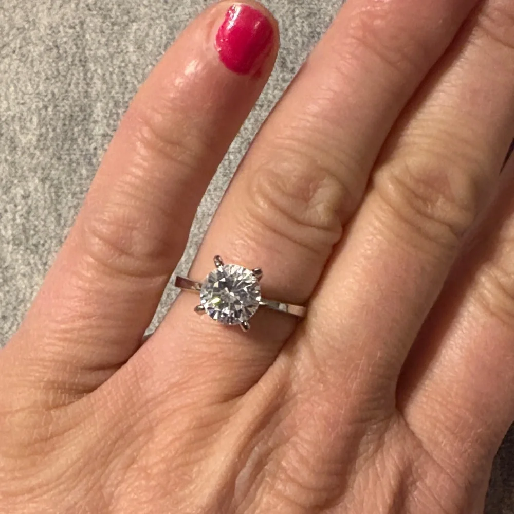 Elegant Silver Diamond Ring - Picture 1 of 5